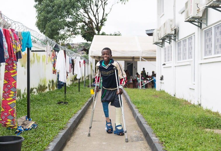 Patient Ulrich at the Hope Center after his orthopedic surgery procedures