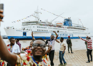 Day Crew celebrate as the Africa Mercy arrives in Cameroon