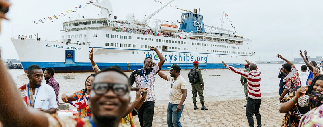 Day Crew celebrate as the Africa Mercy arrives in Cameroon