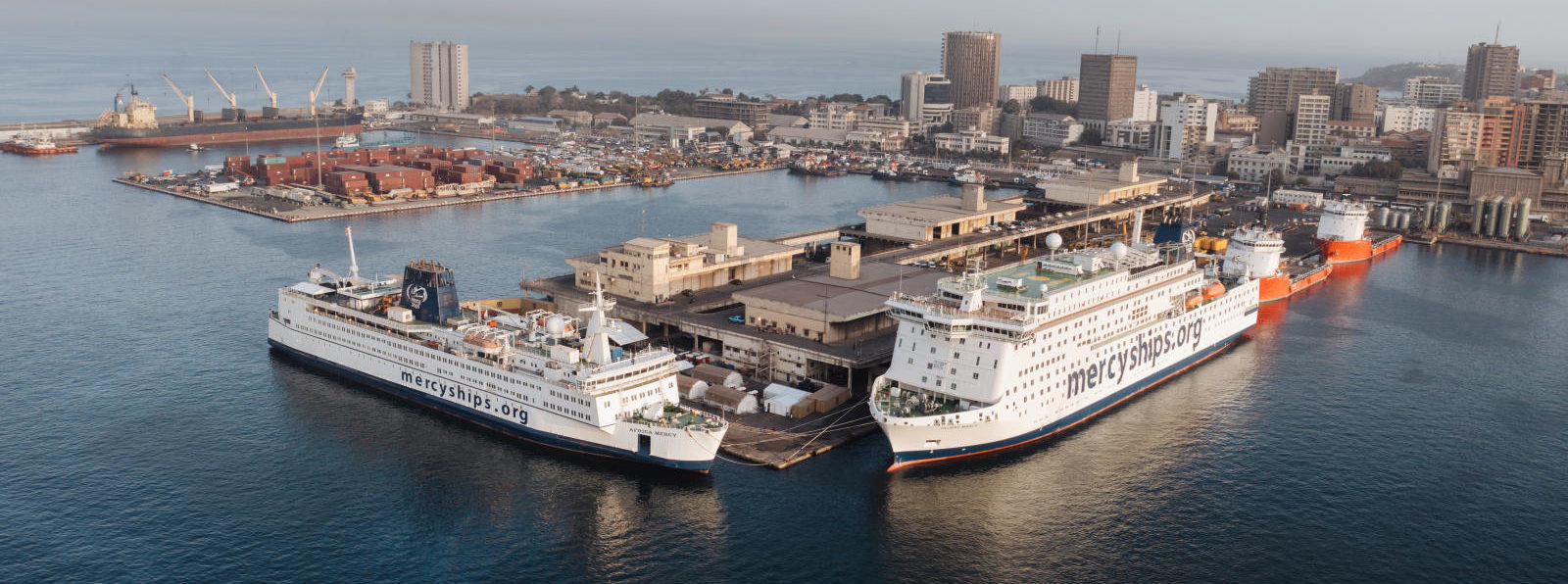 The Global Mercy docked next to the Africa Mercy shortly after arriving in Africa for the first time in Dakar, Senegal.
