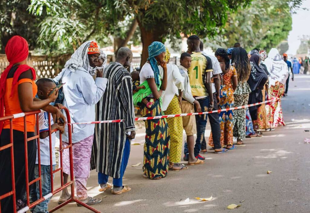 Patients, including Moussa, in line to be seen at an upcountry screening in Kankan. © Mercy Ships