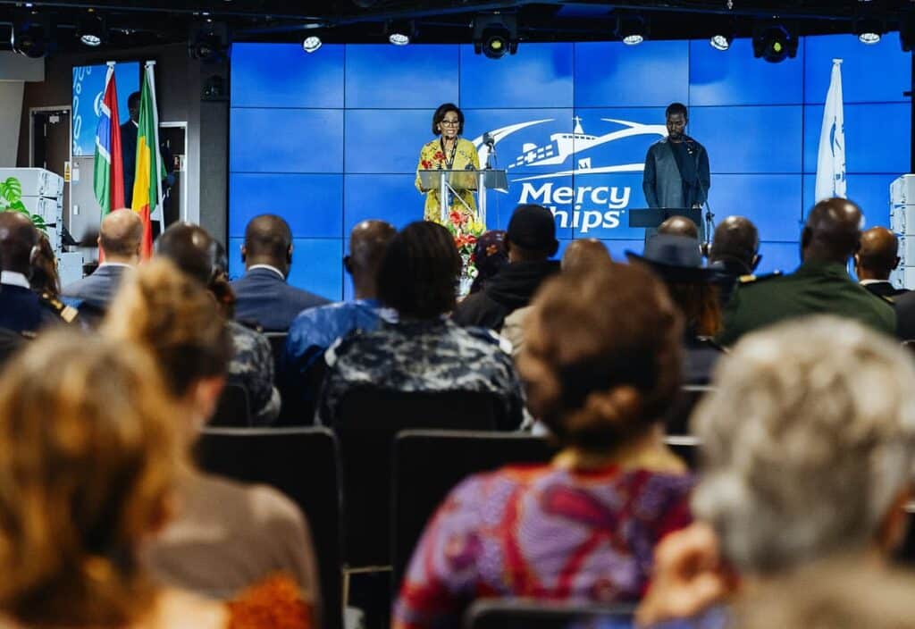 Juliette Tuakli, Independent Contractor, during the Arrival Ceremony at the International Lounge of the Global Mercy. © Mercy Ships